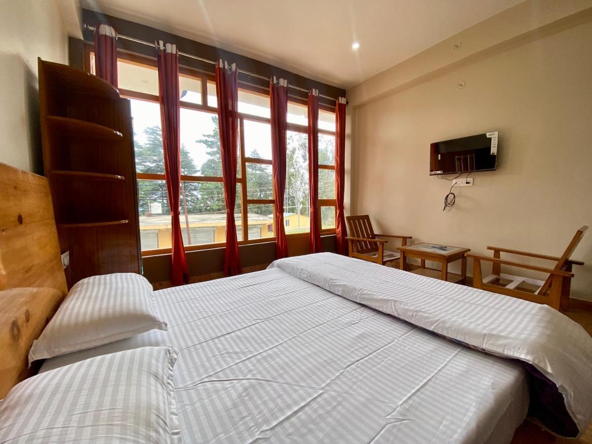 Hotel Mansarovar Inn Munsyari 外观 照片